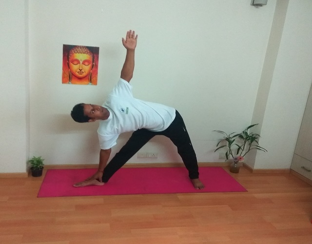 Trikona Asana yoga pose